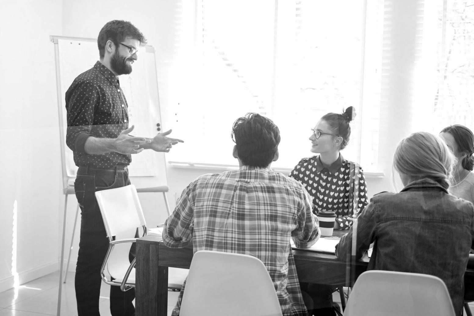 Sessione di mentoring individuale tra coach esperto e studente